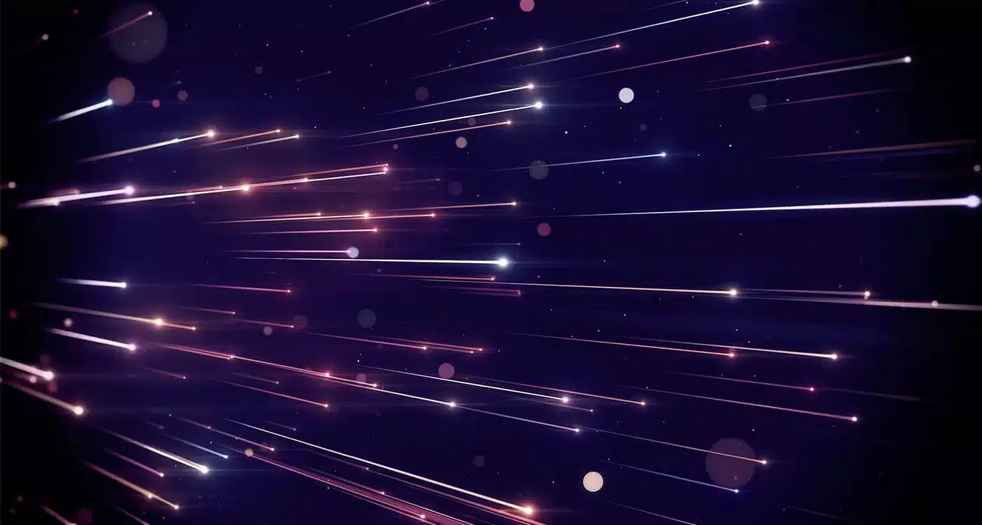Streaks of glowing light and small orbs move diagonally across a dark purple background, creating a dynamic, futuristic effect resembling speed or motion through space. EFESO Management Consultants